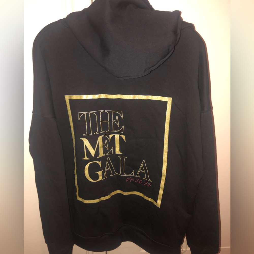 NWT Black Hoodie with Gold The Met Gala Print on back and MTG logo on the front